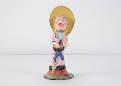 Lot 469 - A late 19th century Thüringen composition ugly woman nodder