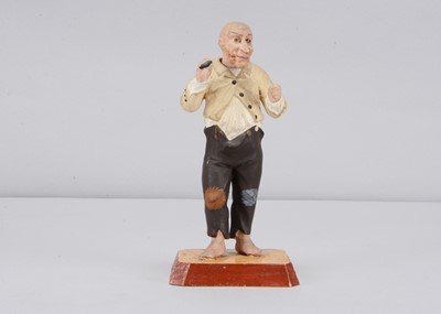 Lot 470 - A mid to late 19th century Thüringen large nosed snuff taker nodder