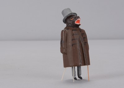 Lot 471 - A late 19th century German bristle toy of a bear in coat and top hat