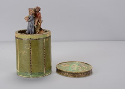 Lot 472 - A mid 19th century German carved wooden pastoral scene of a courting couple jack in the box
