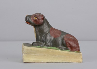 Lot 479 - A mid 19th century Thüringen lying dog squeak toy