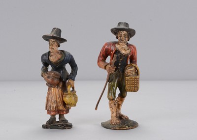 Lot 485 - An 19th century European carved wooden couple with Goitre growths