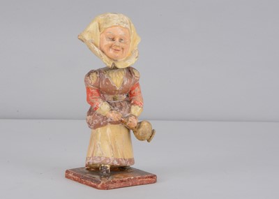 Lot 486 - A late 19th century Thüringen nurse nodder
