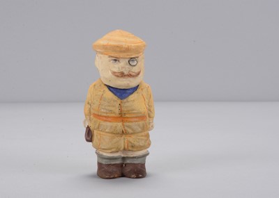Lot 489 - A German 1910-20s composition Sportsman candy or sweet container