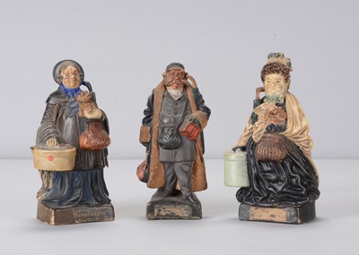 Lot 493 - Three late 19th century terracotta travellers spill holders