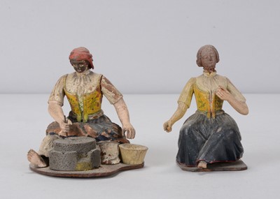 Lot 494 - Two mid 19th century German finely carved wooden women domestic chores