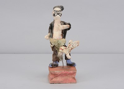 Lot 506 - A Japanese composition Kabuki actor squeak toy