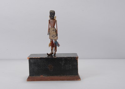 Lot 516 - A mid 19th century Perry & Co’s jigging black man Automaton Dancers