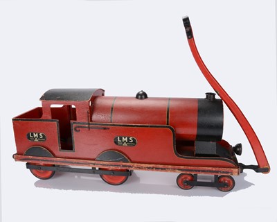 Lot 525 - A large 1930s Triang wooden ride-on LMS tank locomotive