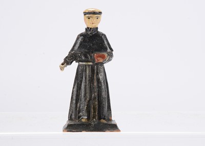 Lot 585 - A small early 19th century German wooden monk