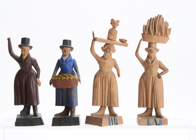 Lot 586 - Four interesting 19th century carved wooden Russian figures