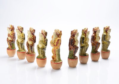 Lot 590 - A rare late 19th century French papier-mâché frog skittles