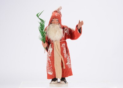 Lot 595 - A early 20th century German Father Christmas candy container