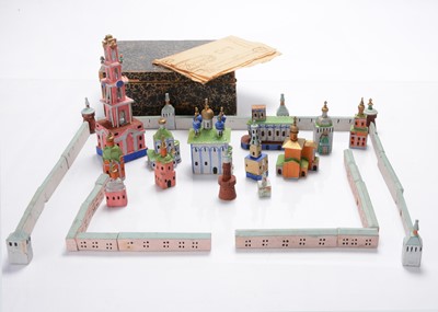 Lot 597 - A Russian painted wooden monastery toy of Troitse-Sergiyeva Lavra in Zagorsk, circa 1900