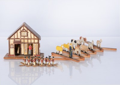 Lot 599 - An Erzgebirge wooden soldier scissor toy