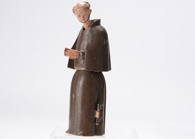 Lot 614 - An early to mid 19th century Oberammergau wooden figure of a monk with hidden chapel in robes