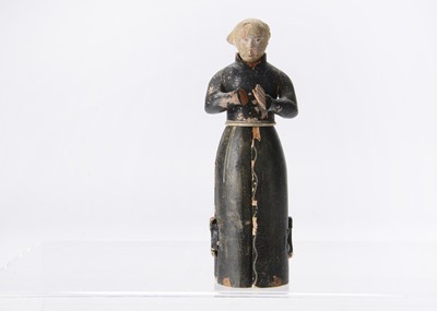 Lot 615 - A mid 19th century Oberammergau wooden figure of a nun with hidden chapel in robes