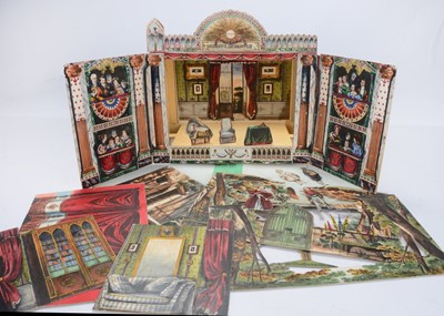 Lot 641 - A rare 1860s French toy theatre ‘Le Petit Theatre Enfantin ou La Comedie Portefeuille’