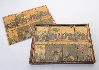 Lot 671 - An 19th century German puzzle using triangular pieces ‘The History of Printing’