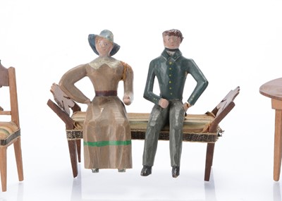 Lot 715 - A rare mid 19th century Seiffen carved and painted wooden couple