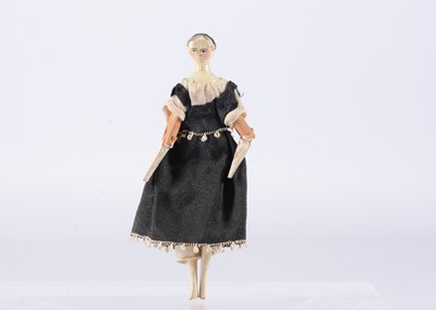 Lot 717 - A mid 19th century Grodnerthal dolls’ house doll