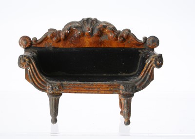 Lot 719 - An 19th century Evans & Cartwright tinplate dolls’ house sofa