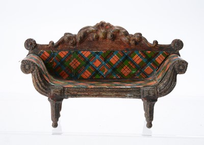 Lot 720 - An 19th century Evans & Cartwright tinplate dolls’ house sofa