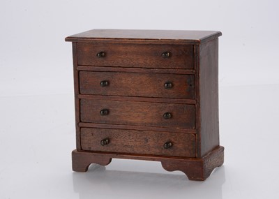 Lot 726 - A rare early 19th century John Bubb  large scale dolls’ house chest of drawers
