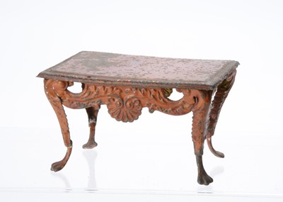 Lot 737 - An 19th century Evans & Cartwright tinplate dolls’ house console table