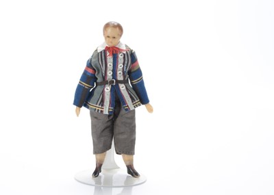 Lot 742 - A mid 19th century wax shoulder-head dolls’ house boy doll