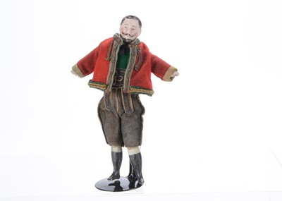 Lot 743 - An 19th century  German bisque shoulder-head male dolls’ house doll