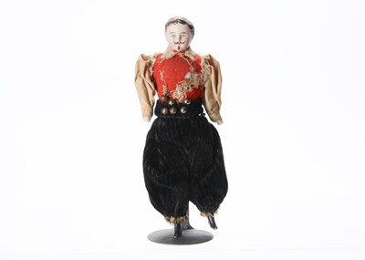 Lot 744 - An 19th century  German bisque shoulder-head male dolls’ house doll