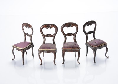 Lot 750 - Four 19th century Rock & Graner tinplate dolls’ house dining chairs