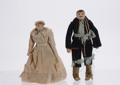 Lot 753 - Two mid 19th century paper dolls’ house dolls