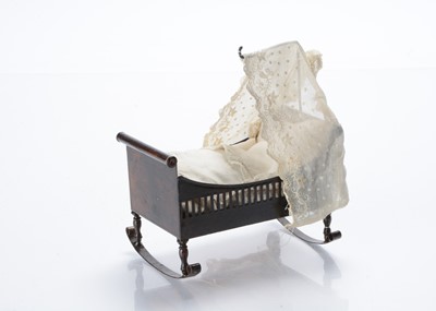 Lot 754 - A 19th century Rock & Graner tinplate dolls’ rocking cradle