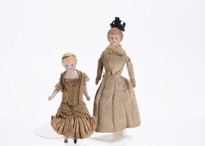 Lot 775 - Two German bisque shoulder-head dolls’ house dolls