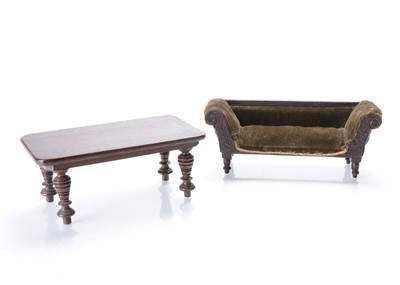 Lot 784 - A late 19th century English dolls’ house sofa