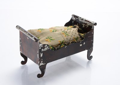 Lot 789 - An 19th century Rock & Graner tinplate dolls’ house sleigh bed