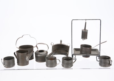 Lot 799 - A rare early 19th century English tinplate dolls’ house clockwork spit