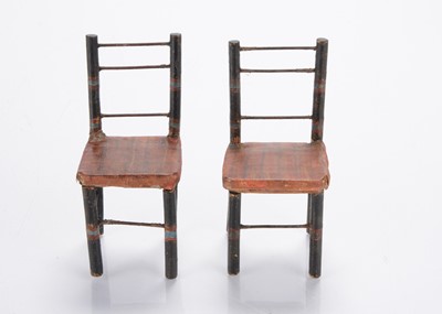 Lot 807 - A rare pair of English 1820/30s faux bamboo dining chairs