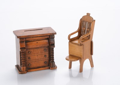 Lot 809 - A William IV dolls’ house treen chest of drawers money bank