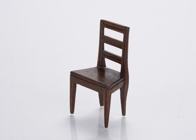 Lot 810 - An 19th century English carved wooden ladder back dining chair