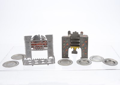 Lot 819 - Two 19th century English small scale dolls’ house metal fire grates