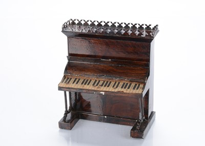 Lot 837 - A late 19th century Rock & Graner tinplate dolls’ house upright piano