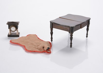 Lot 874 - An 19th century Waltershausen dolls’ house extending dinning table