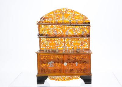 Lot 880 - An unusual late 19th century large scale dolls’ house tortoiseshell dresser