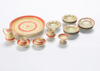 Lot 883 - A German turned and painted wooden dolls’ house tea set