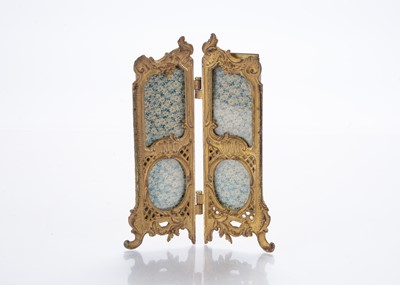 Lot 898 - A late 19th century gold painted cast-metal screen photograph frame
