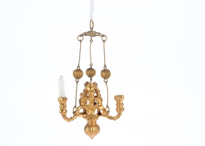 Lot 900 - A German gilt metal dolls’ house chandelier
