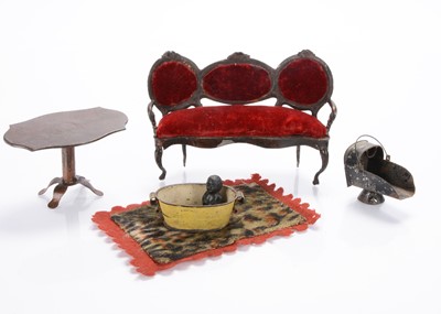 Lot 910 - An 19th century Rock & Graner tinplate dolls’ house sofa and occasional table